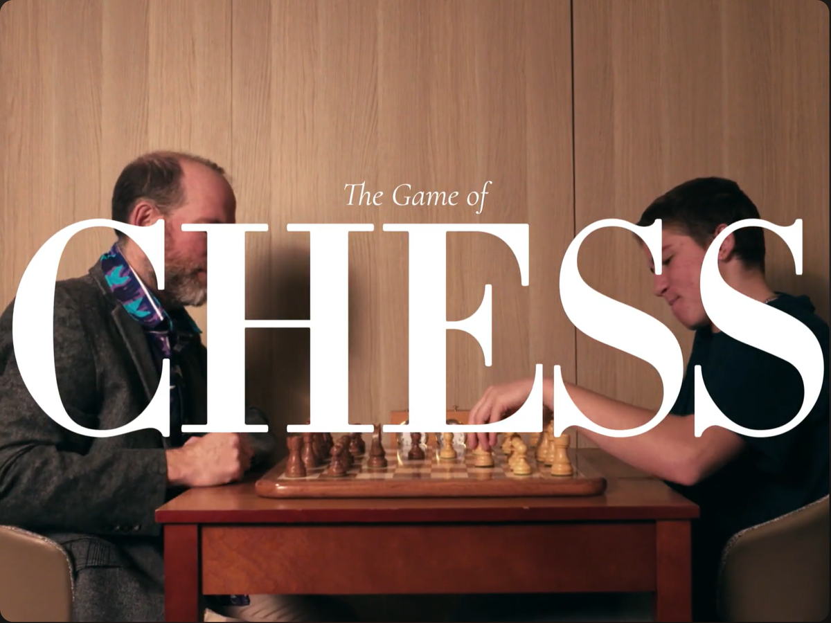 A wooden chess set ready for a game