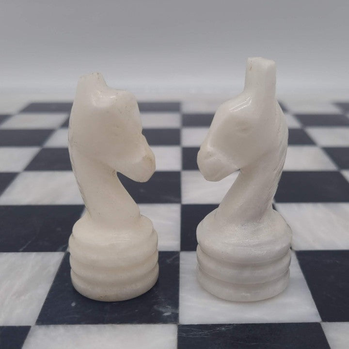 Black & White Marble Chess Set - Damaged Product Sale - chipped white Knight comparison