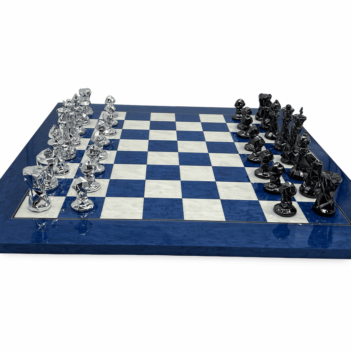 Blue Diamond Chess Set - on blue wooden chessboard side view