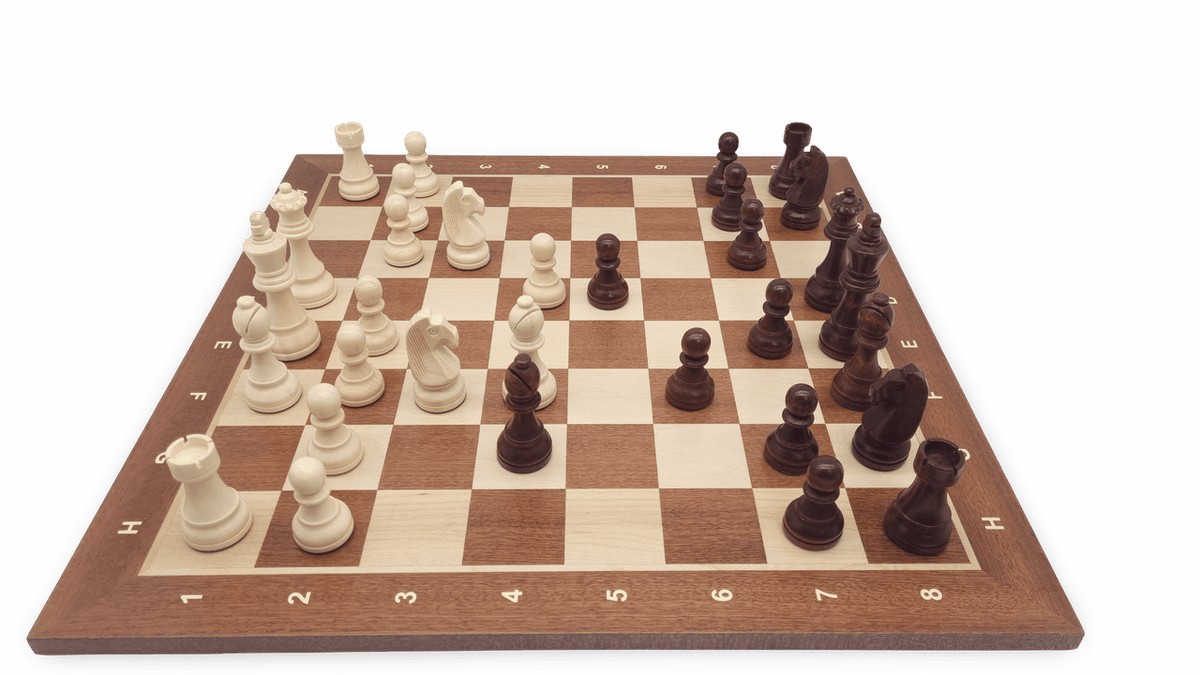 Wooden chess pieces displayed on board - side view