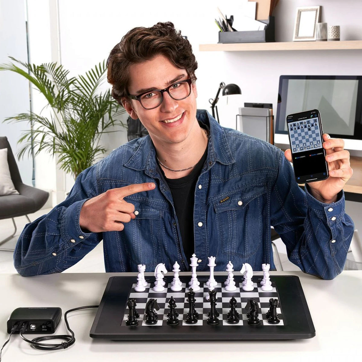 Millennium Chess Computer The King Competition shown with additional ChessLink for online play via device