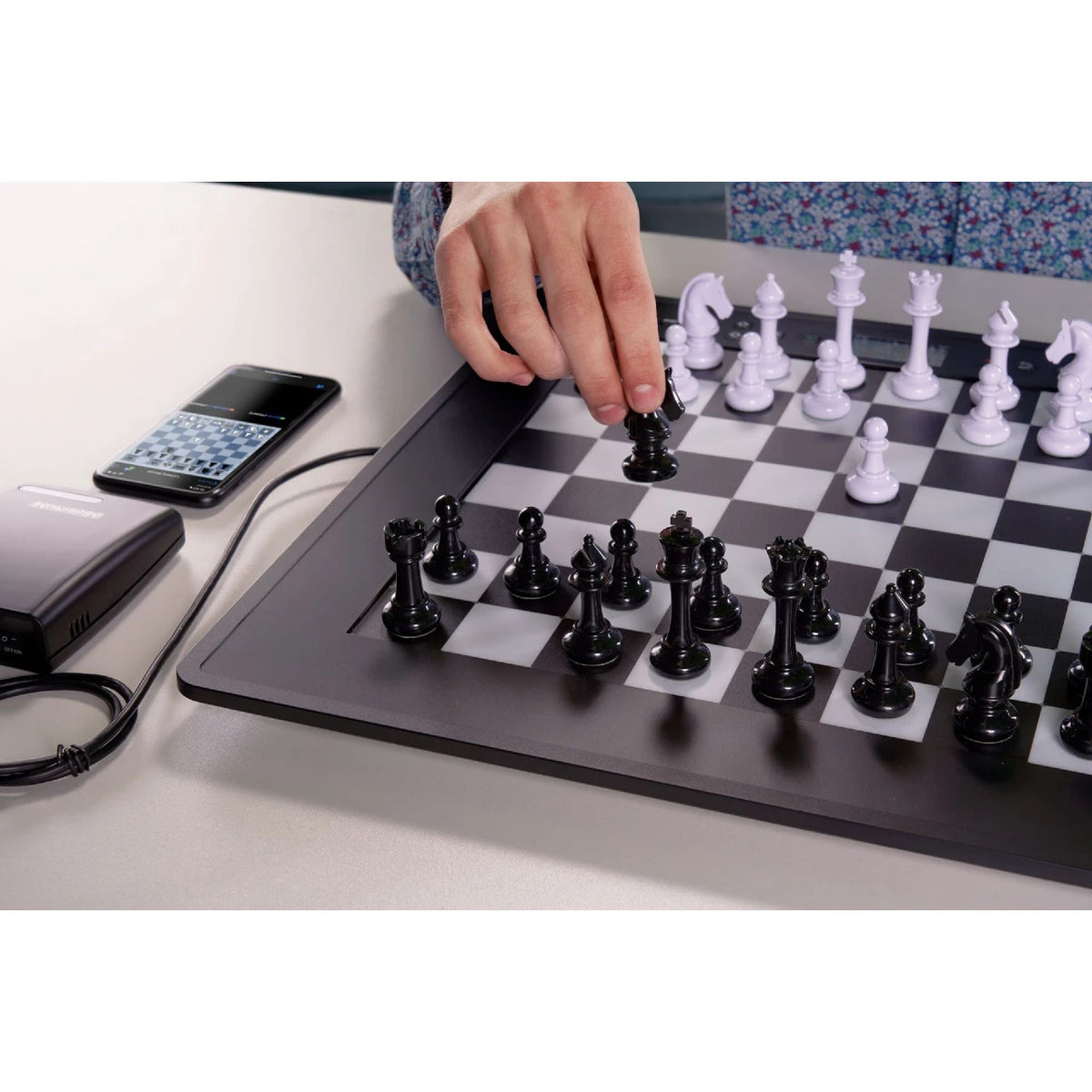 Millennium Chess Computer The King Competition shown with additional ChessLink for online play via mobile phone