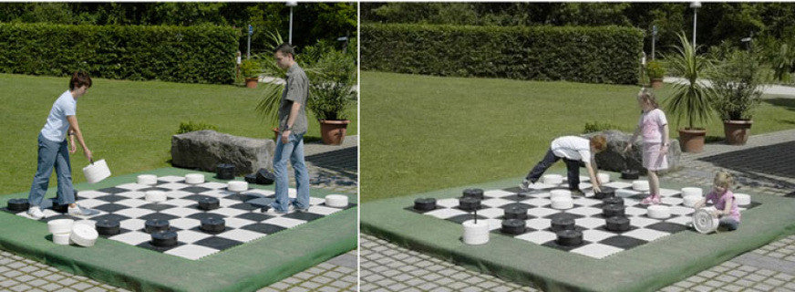 Giant Chess 22cm Giant Checkers Pieces (CC220) shown on board